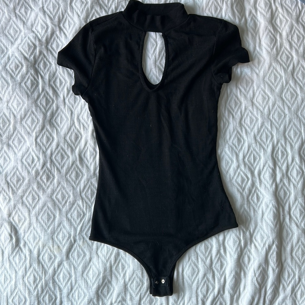 Me to We black bodysuit